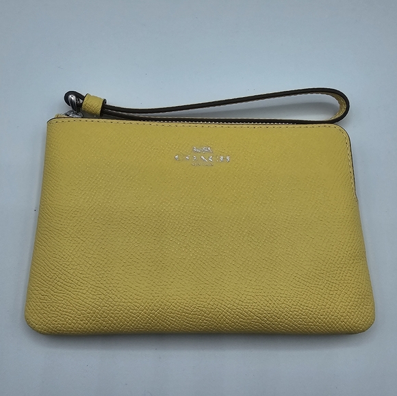 Coach Handbags - Coach Retro Yellow Corner Zip Wristlet